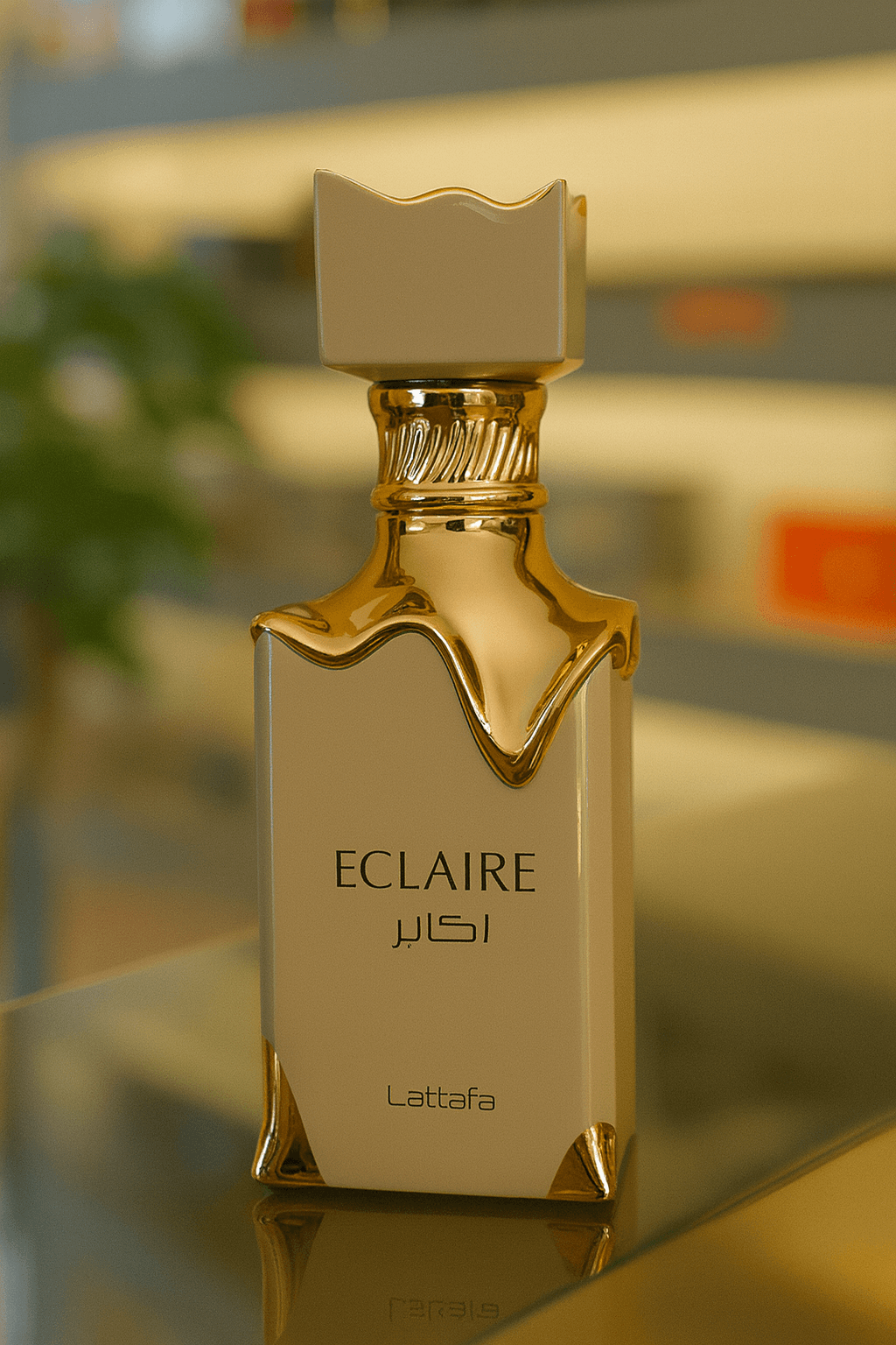 A bottle of Lattafa Eclaire perfume for women.